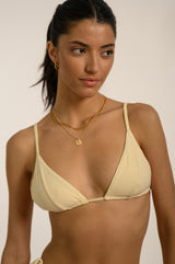 BIKINI DOLLS Daria minimal triangle bikini top with sliding cups in Ivory