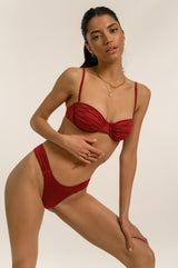 BIKINI DOLLS Bella high-cut bikini top with ruched sides in merlot