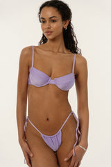 BIKINI DOLLS Gigi minimal bikini bottom with adjustable coverage and side ties in Lilac