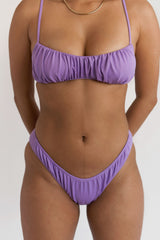 BIKINI DOLLS Arielle ruched bikini bottom in Lavender purple
