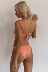 BIKINI DOLLS Naomi high-cut bikini bottom in Peach Pink