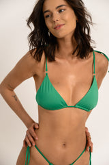 BIKINI DOLLS Gigi minimal triangle bikini top with sliding cups and ring detailing in Emerald green close up