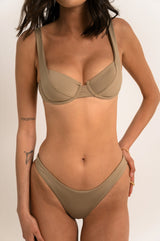 BIKINI DOLLS Valerie underwire balconette bikini top in Clementine orange in Latte beige with matching bottom close up
