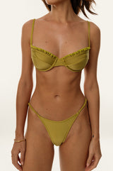 BIKINI DOLLS Carmen bottom with stretchy elastic scrunchies on the side in Peridot closeup