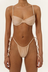 BIKINI DOLLS Gigi minimal bikini bottom with adjustable coverage and side ties in Pearl closeup