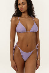 BIKINI DOLLSBIKINI DOLLS Gia minimal bikini bottom with side ties in Lilac