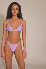 BIKINI DOLLSBIKINI DOLLS Gia minimal bikini bottom with side ties in Lilac video