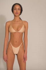 BIKINI DOLLS Kiara minimal high cut bikini bottom with thin side straps and ring detailing in Pearl video