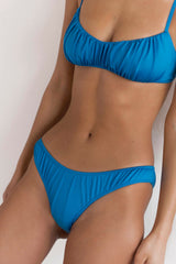 BIKINI DOLLS Arielle ruched bikini top in Azure Blue