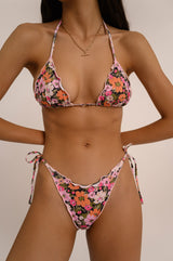 BIKINI DOLLS June ruffled bikini bottom with side ties and ring detailing in the Les Fleurs vintage floral print